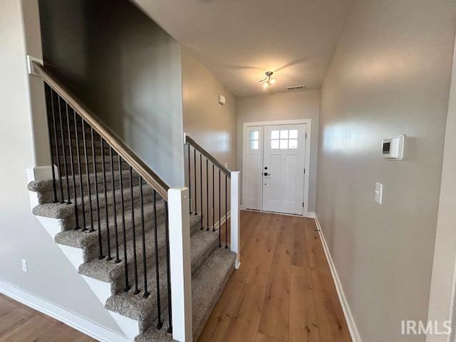 entrance foyer with wood-type flooring