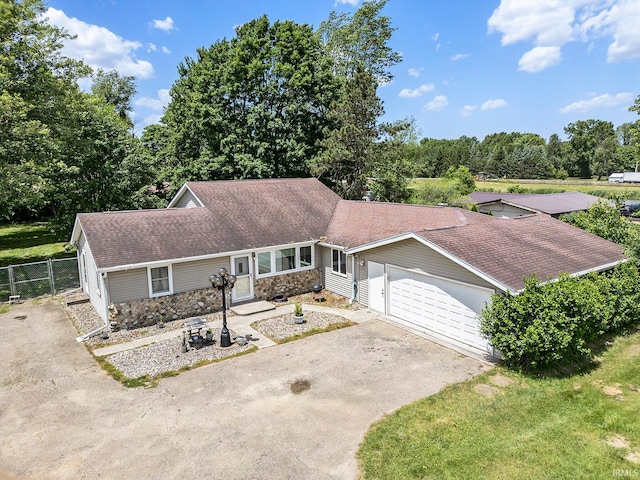 single story home with a garage