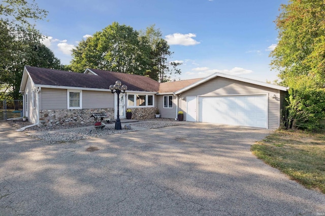 single story home with a garage