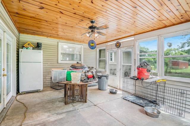 sunroom with wood ceiling and ceiling fan