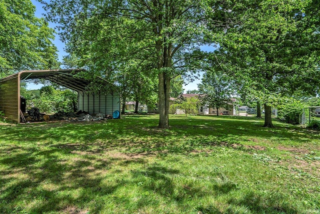 view of yard with a carport