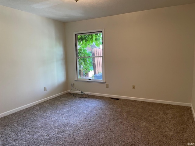 view of carpeted spare room