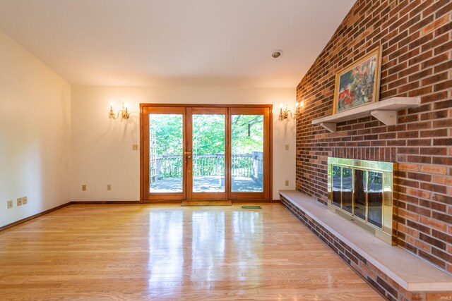 walk in closet with light carpet