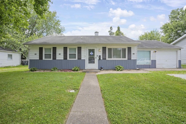 ranch-style home featuring a porch, a garage, and a front yard