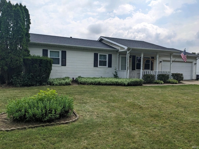 ranch-style home featuring a garage, a porch, and a front lawn