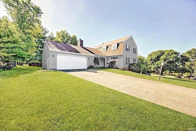 view of front facade with a chimney, concrete driveway, a gambrel roof, a garage, and a front lawn