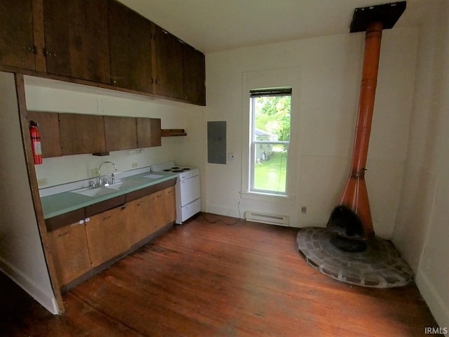 kitchen featuring dark wood-type flooring, electric panel, a baseboard heating unit, white range, and sink