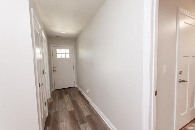 interior space with dark hardwood / wood-style floors