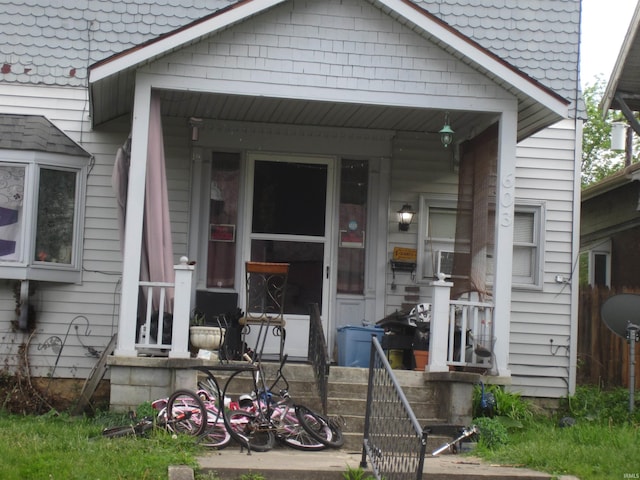 entrance to property with covered porch