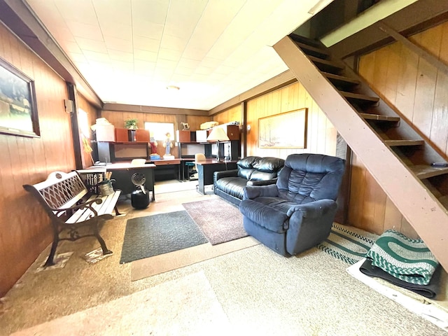 living room featuring wood walls