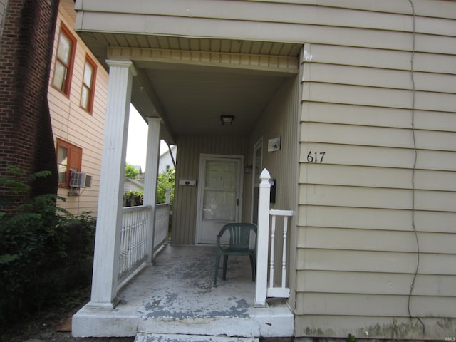 doorway to property with cooling unit