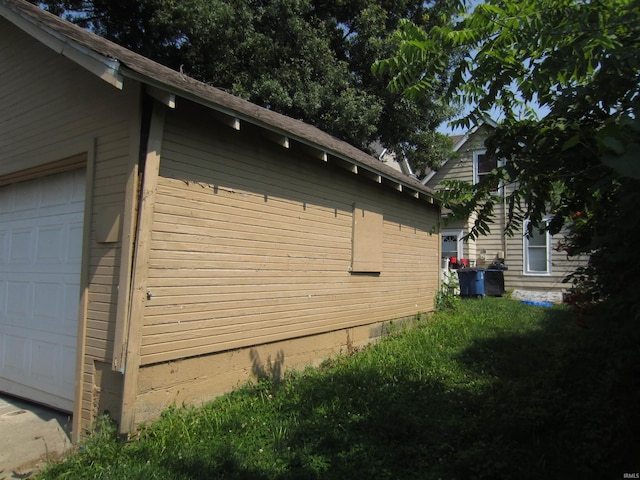 view of home's exterior with a garage