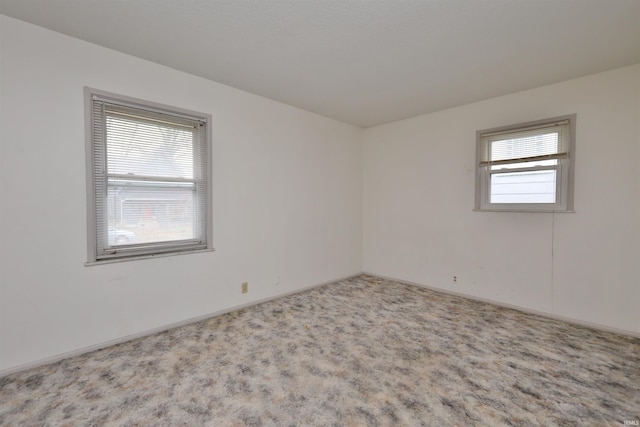 view of carpeted spare room