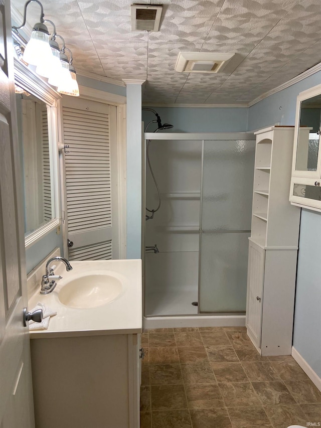 bathroom with tile floors, an enclosed shower, and oversized vanity