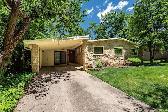 view of front facade featuring a carport, french doors, and a front lawn