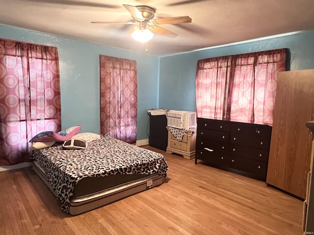 bedroom featuring ceiling fan and light wood-type flooring