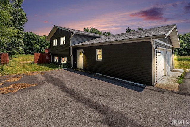 view of property exterior at dusk