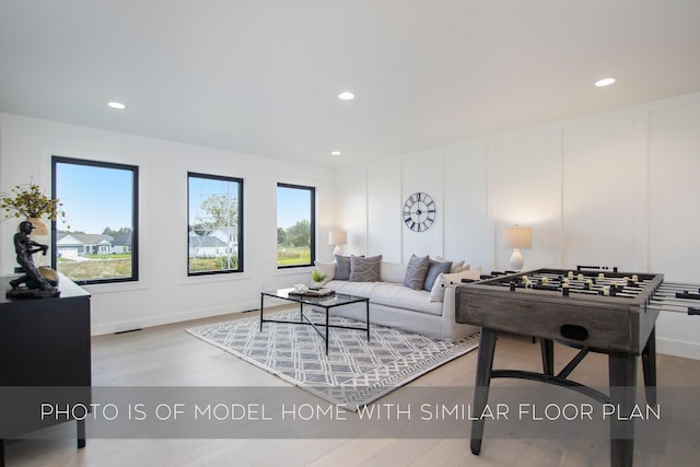 living room featuring light wood-type flooring