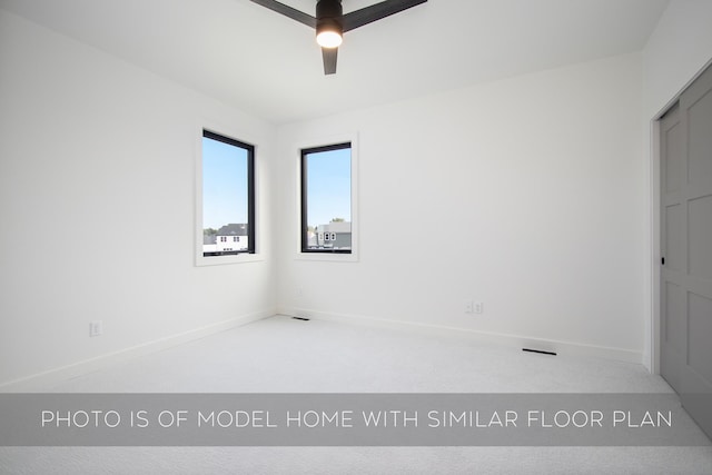 unfurnished room featuring ceiling fan