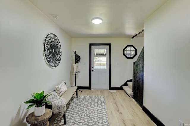 foyer entrance featuring light wood-type flooring