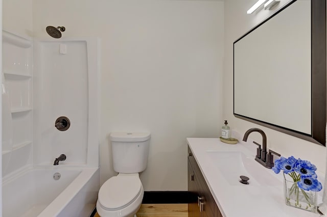 full bathroom with shower / bathtub combination, vanity, and toilet