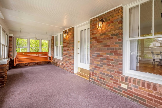 view of unfurnished sunroom