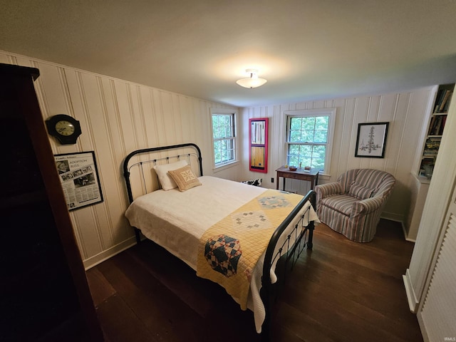 bedroom featuring dark wood-type flooring