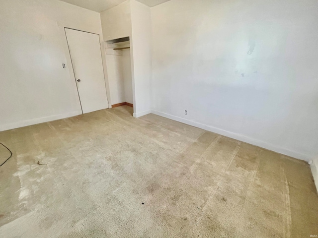 unfurnished bedroom featuring carpet