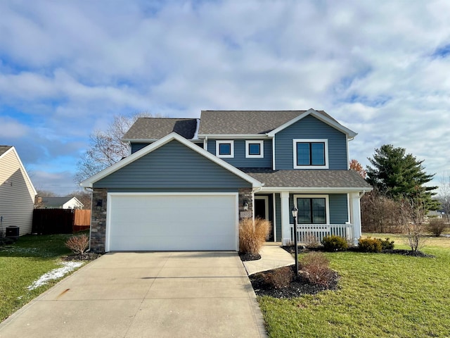 view of front of house with central air condition unit, a garage, a porch, and a front yard