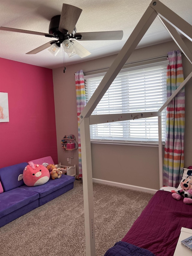 bedroom featuring ceiling fan and carpet floors