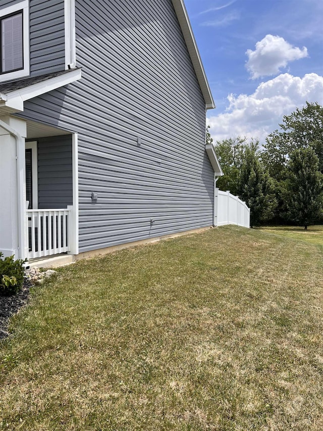 view of home's exterior featuring a lawn