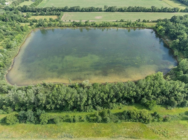 aerial view with a water view and a rural view