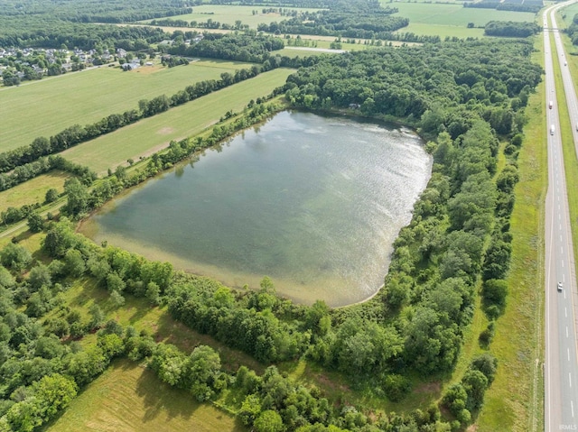 aerial view featuring a water view and a rural view