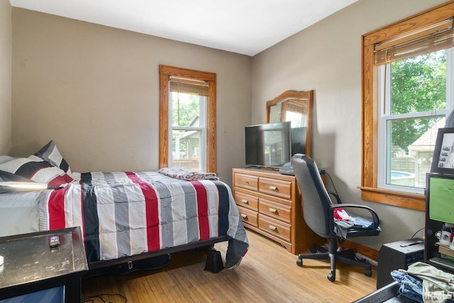 bedroom featuring hardwood / wood-style floors