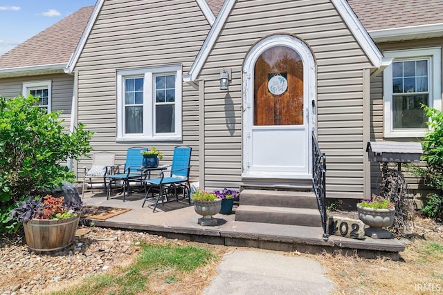 property entrance with a patio area