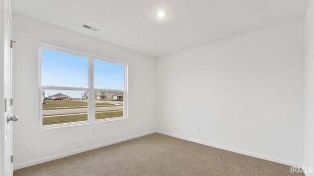 view of carpeted spare room