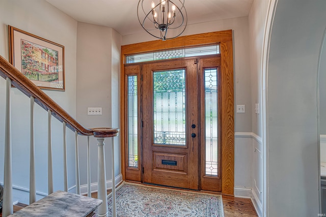 entryway featuring an inviting chandelier