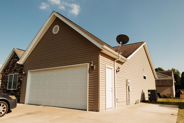 view of home's exterior with a garage