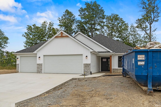 view of front of property with a garage