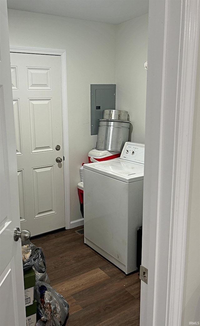 laundry area featuring washer / clothes dryer, electric panel, and dark hardwood / wood-style floors