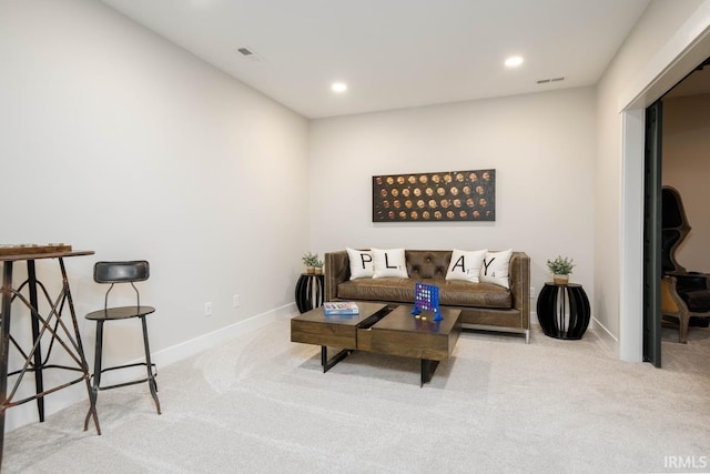 living room featuring light carpet