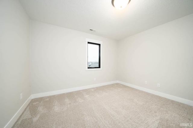 137 W Basalt Dr, Huntertown, IN 46748 - carpeted spare room featuring baseboards and visible vents