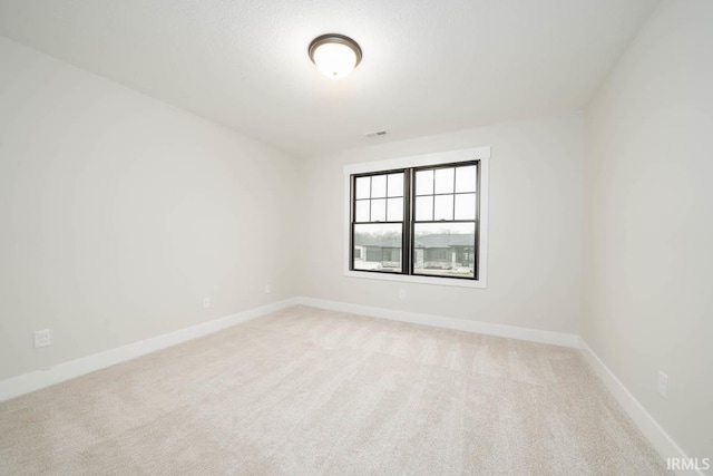 137 W Basalt Dr, Huntertown, IN 46748 - empty room featuring light carpet and baseboards