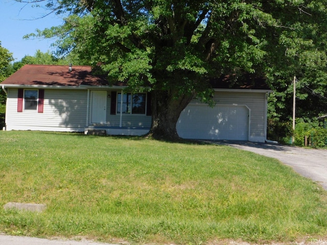 ranch-style house with a front yard and a garage