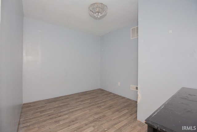 empty room with light wood-type flooring