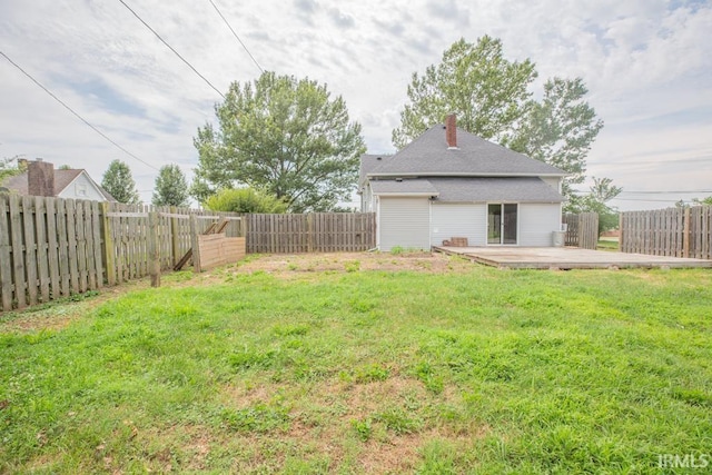 view of yard with a wooden deck