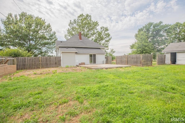 view of yard with a wooden deck