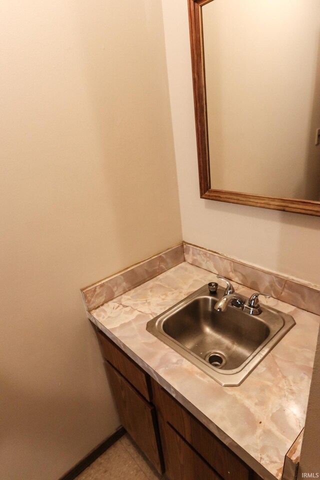 bathroom featuring sink and tile patterned floors