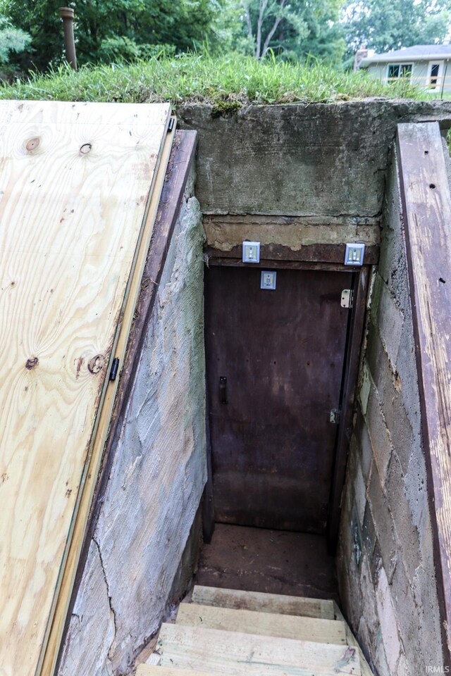 view of entry to storm shelter