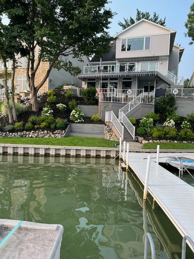 dock area with a water view